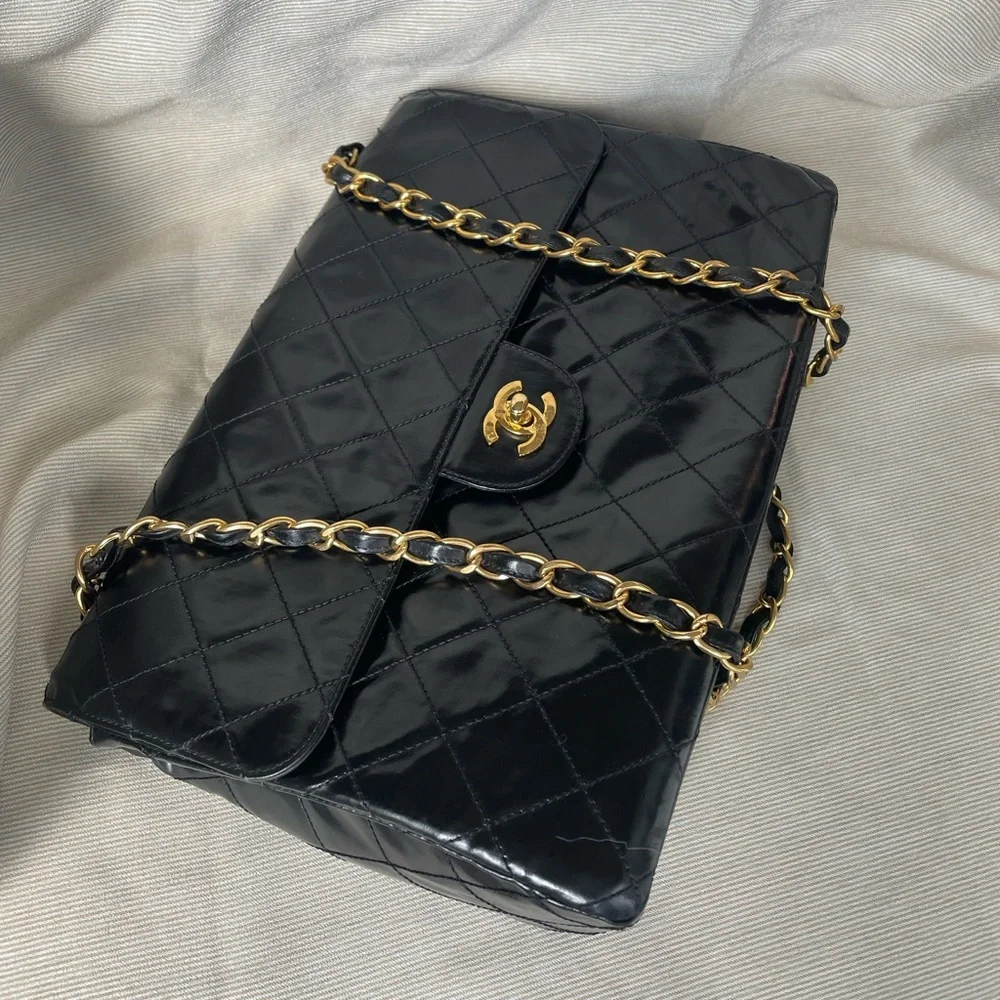CHANEL Black Quilted Bag with Gold Chain - Picture 2 of 16